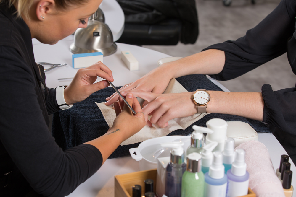 SWTAFE Pure Academy beauty therapist applying nails