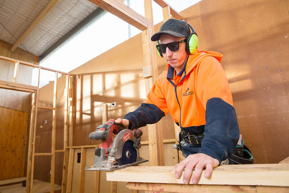 Nathan working in building construction