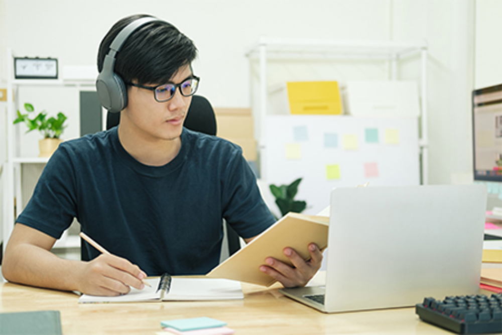 Student working at laptop